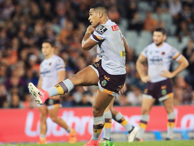 Jamayne Isaako kicks the winning penalty goal for the Broncos.