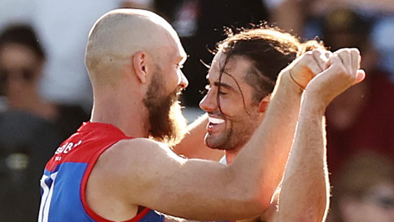 MELBOURNE. 24/02/2023. AFL. St Kilda vs. Melbourne at Moorabbin. Brodie Grundy of the Demons is congratulated by Max Gawn after a 4th qtr goal. Pic: Michael Klein