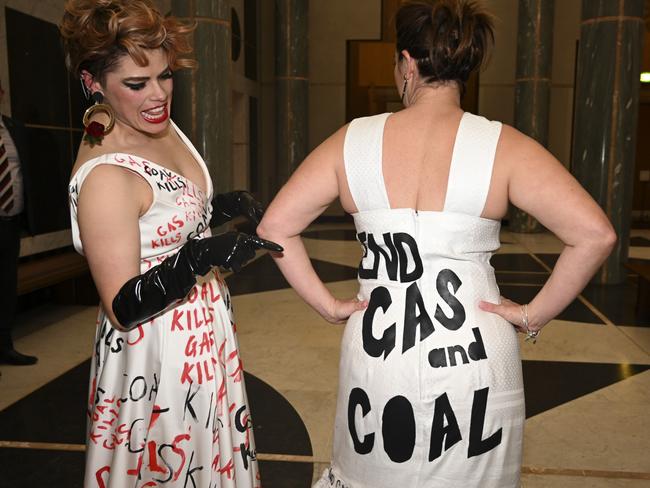 Claudia Perkins and Sarah Hanson-Young arriving at the Midwinter Ball at Parliament House in Canberra. Picture: NCA NewsWire / Martin Ollman