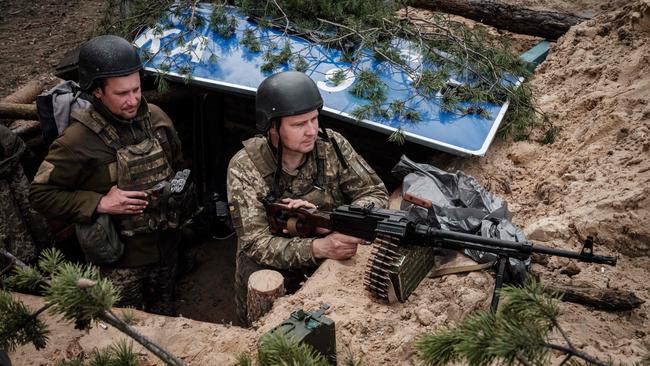 Ukrainian soldiers rest at their position near Lyman, eastern Ukraine. Picture: AFP