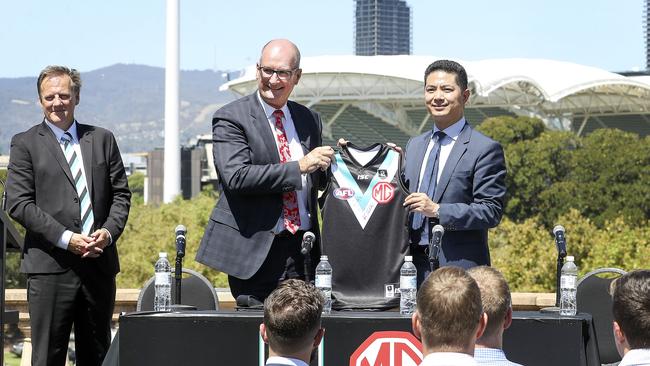 Port Adelaide chief executive Keith Thomas (left), chairman David Koch and MG Motor Australia chief executive Peter Ciao announcing the new partnership between the two organisations. Picture: Sarah Reed