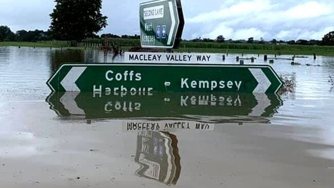 Road signs under water last month. Photo from Kempsey Shire Council