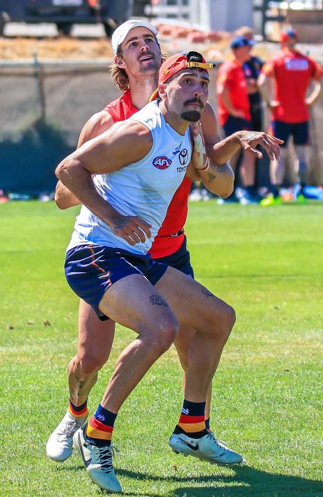 James Peatling battles with Izak Rankine at Crows training. Picture: Adelaide FC