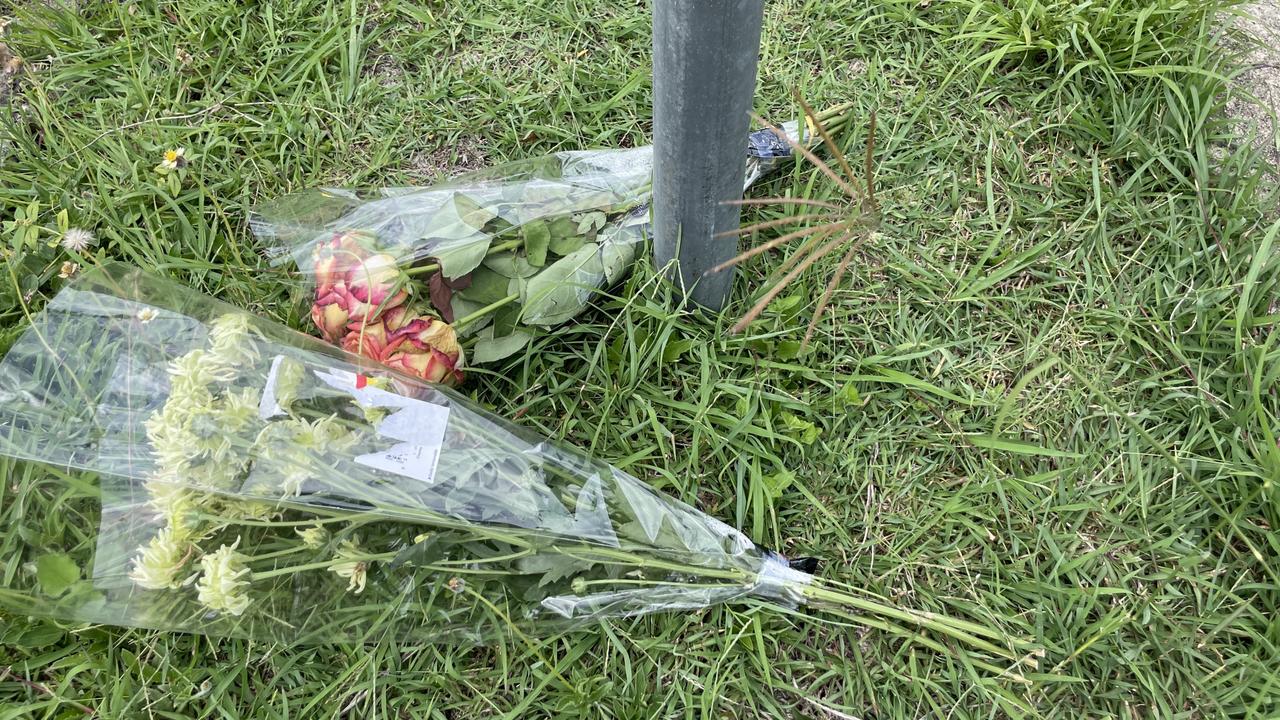 Memorial flowers on Robertson Road, Raceview, on January 5, following the death of a mobility scooter rider the previous day. Picture: Nicola McNamara