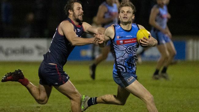 Sturt’s Steven Slimming bursts clear in the Double Blues’ upset 23-point win against Norwood at a muddy Norwood Oval last Friday night. Picture: Naomi Jellicoe