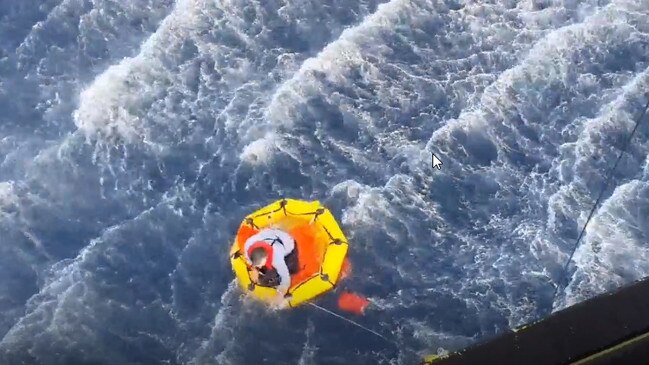 The two men were seen in a life raft before it started taking on water. Picture: Supplied