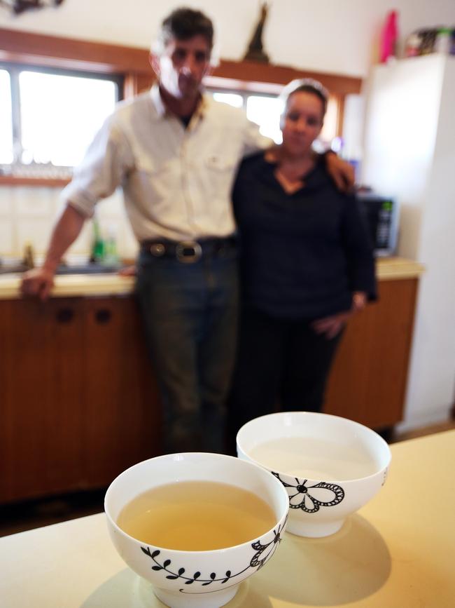 A comparison of the dam water and clean water. The family use the dam water for drinking and cleaning. Picture: Sam Ruttyn