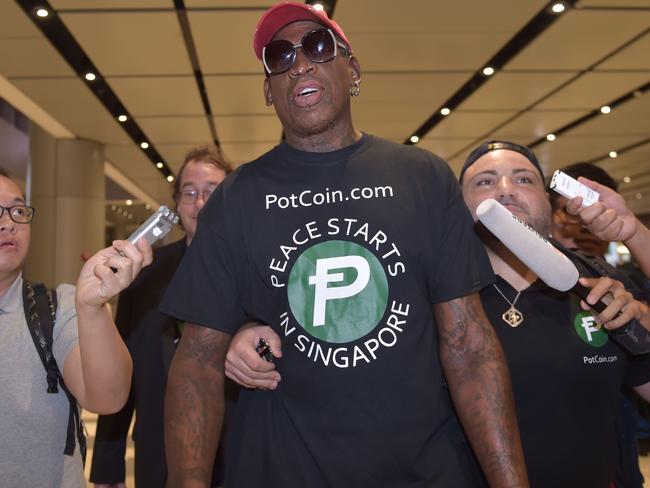 Retired American professional basketball player Dennis Rodman arrives at Changi International. Picture: AFP