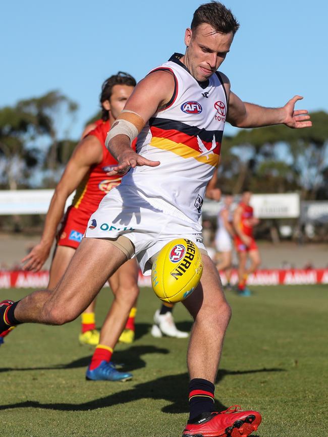 Crow Brodie Smith on the run against Gold Coast in the Marsh Community Series match at Noarlunga Oval. Picture: AFL Photos.