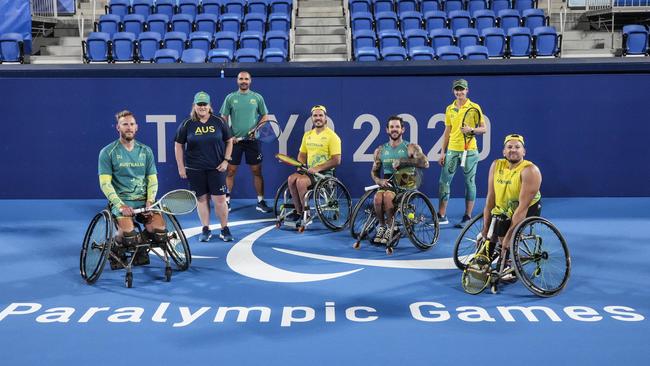 Australia’s wheelchair tennis team, from left, Ben Weekes, Martyn Dunn, Heath Davidson and Dylan Alcott, with their support crew at Ariake Tennis Park in Tokyo. Picture: Getty Images