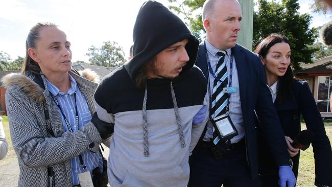 Detectives arrested 26-year-old Harley Thompson a few doors down from the burned out Leonard St home. Picture: David Swift