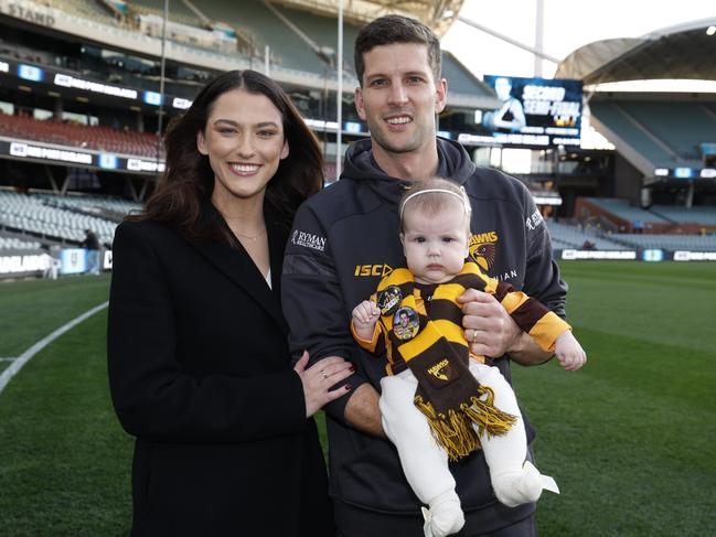 Luke Breust with wife Anthea and daughter Freya ahead of his 300th game. Picture: Michael Klein