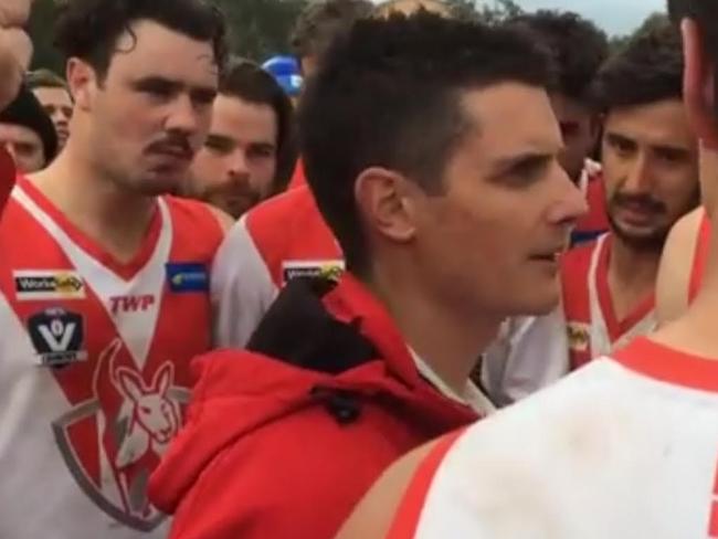 Greg Hoskin works the huddle at Fish Creek, Ryan McGannon (left) tuning in.