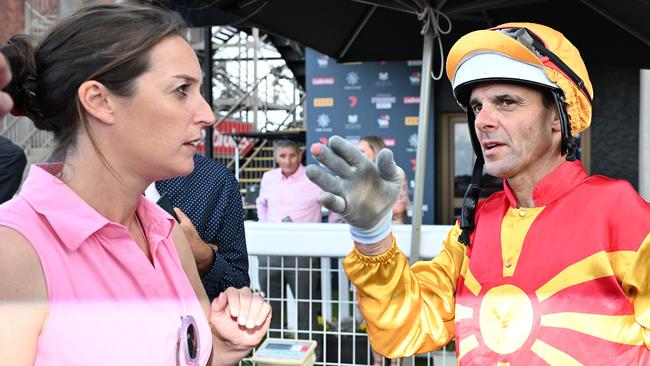 Annabel Archibald speaks with jockey Noel Callow after the race. Picture: Grant Peters/Trackside Photography