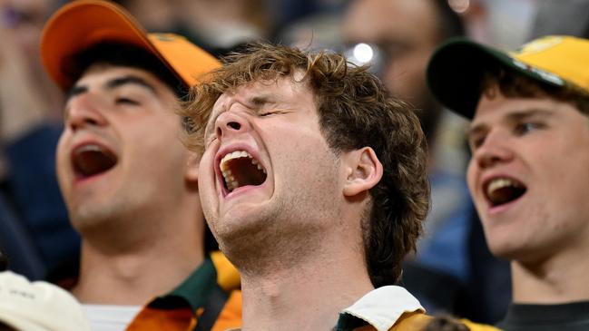 Fans of Australia sing the national anthem prior to the Wales clash. (Photo by Hannah Peters/Getty Images)