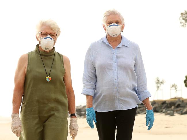 Bribie Island residents Diane Oxenford, 75, and Irene Sourgnes, 75, are calling for the island to be closed off to the mainland to protect the elderly population. Photographer: Liam Kidston.