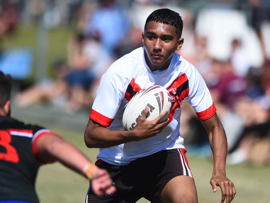 Boys Rugby League State Championship held at Northern Division, Brothers Leagues ground, Townsville. South West (black) v Wide Bay (white). 16-18 years. Blake Dynevor of Murgon SHS.