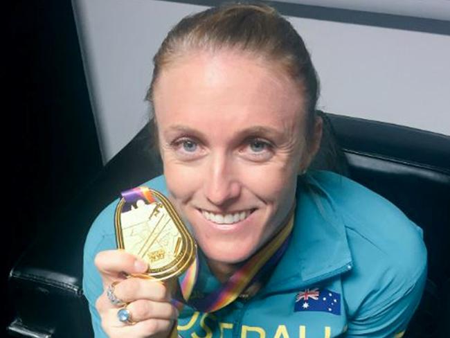 Sally Pearson with her gold medal after she won the 100m hurdles at the World Athletics Championships in London.