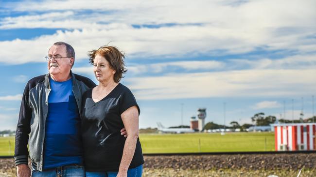 Burton residents Ian and Karen Gavin are worried plans to introduce new air safety zones around the RAAF Edinburgh base could stop their planned subdivision. Picture: ROY VANDERVEGT/AAP