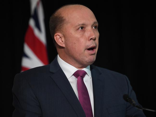 Australian Minister for Immigration and Border Protection Peter Dutton addresses an event to mark Refugee Week 2017 at Parliament House in Canberra, Tuesday, June 20, 2017. (AAP Image/Lukas Coch) NO ARCHIVING