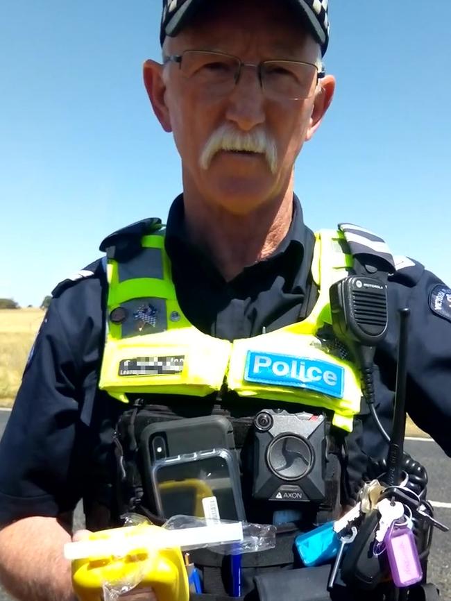 The cop painstakingly explains the nature of a traffic offence as he repeatedly asks the sovereign citizen to hand over his licence. Picture: YouTube.