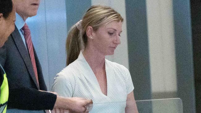 Jamie Kah (L) and stablehand Ruby McIntyre leaves the white powder hearing in Melbourne. Picture: Tony Gough