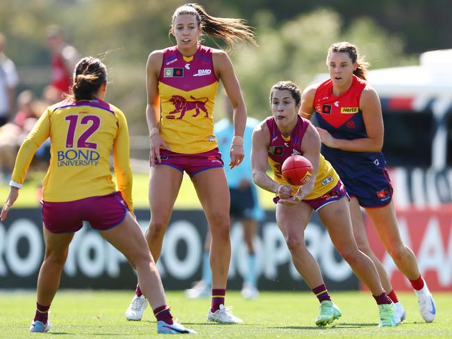 MELBOURNE, AUSTRALIA - SEPTEMBER 07: Ally Anderson of the Lions handballs during the round two AFLW match between Melbourne Demons and Brisbane Lions at Casey Fields, on September 07, 2024, in Melbourne, Australia. (Photo by Morgan Hancock/AFL Photos/via Getty Images)