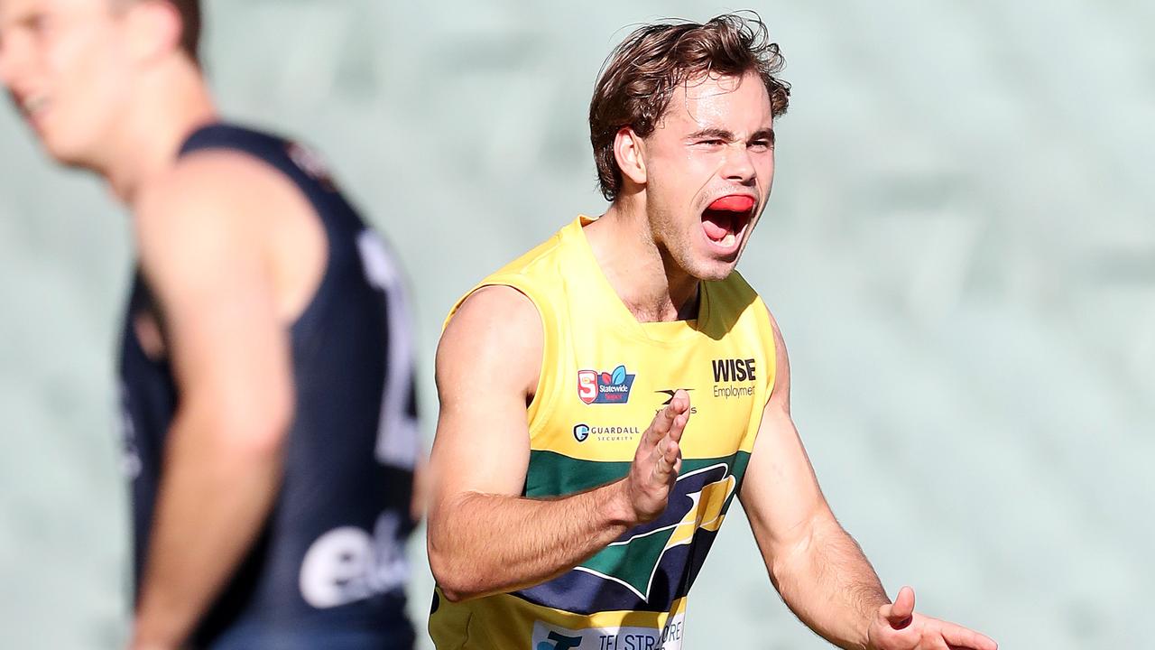 Lachlan McNeil celebrates a goal in the SANFL last season.