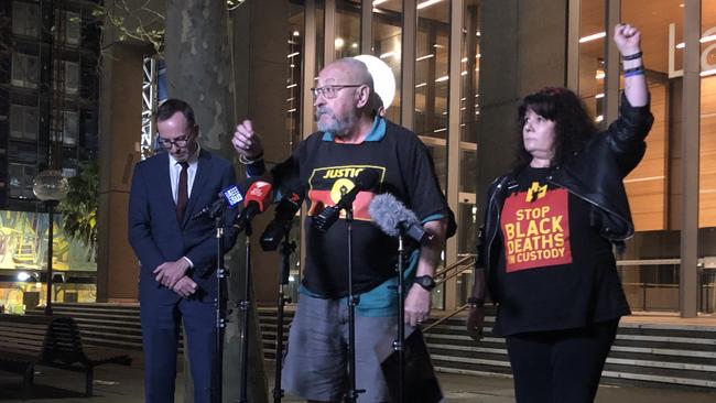 Greens MP David Shoebridge stands in the background while protest organiser Raul Bassi declares the Black Lives Matter rally will go ahead. Picture: Angelica Snowden. Picture: Angelica Snowden