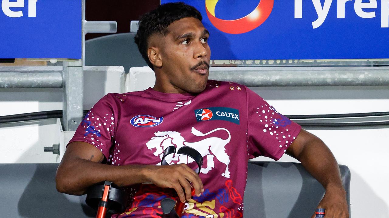 BRISBANE, AUSTRALIA - MARCH 08: Keidean Coleman of the Lions is seen injured on the bench during the 2024 AFL Opening Round match between the Brisbane Lions and the Carlton Blues at The Gabba on March 08, 2024 in Brisbane, Australia. (Photo by Russell Freeman/AFL Photos via Getty Images)