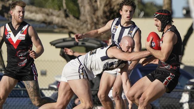 MPFNL: Devon Meadows’ Joel Hillis caught with the ball. Picture: Valeriu Campan