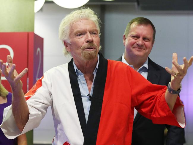 In better times: Sir Richard Branson and Brisbane Airport CEO Gert-Jan de Graaff, Virgin Australia promotes their new route from Brisbane to Japan. Picture: Liam Kidston.