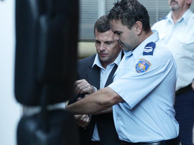 Killer Paul Mulvihill as he leaves court for prison. Picture: News Corp.