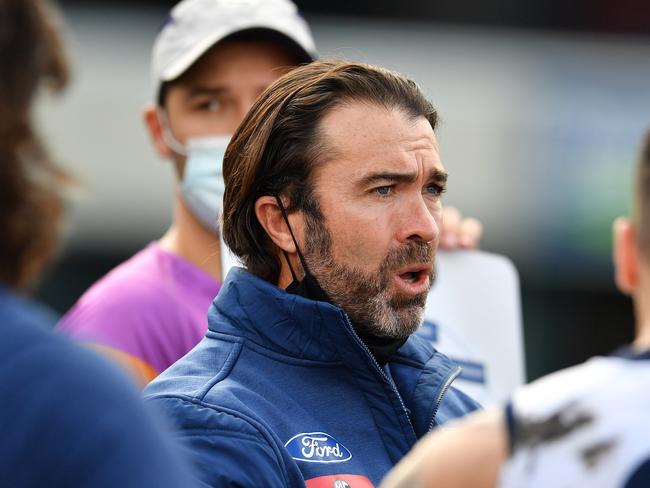 HOBART, AUSTRALIA - JULY 31: Chris Scott, Senior Coach of the Cats addresses the players during the round 20 AFL match between North Melbourne Kangaroos and Geelong Cats at Blundstone Arena on July 31, 2021 in Hobart, Australia. (Photo by Steve Bell/AFL Photos/via Getty Images)