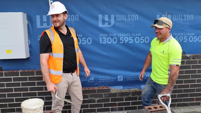 Housing Minister Felix Ellis with tradie. State government spruiks its housing policies. Picture: Supplied