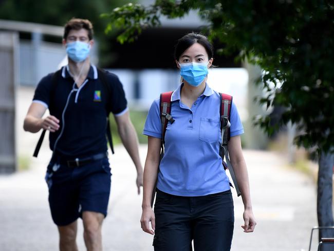 Morning commuters wear face masks in Brisbane after a three-day lockdown has been imposed due to a growing covid cluster. Picture: NCA NewsWire / Dan Peled