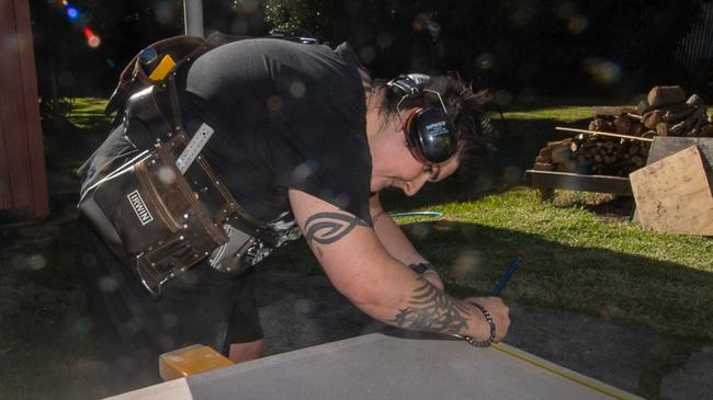 Women in Trades: Breaking the Barrier program participant Brooke Brennan, of Casino measuring wall sheeting in Lismore. She wants to use the workshop as a springboard into a carpentry and building trade. Picture: Cath Piltz