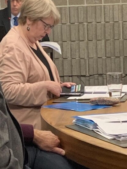 Cr Beth Warren using her phone. Pic: Supplied