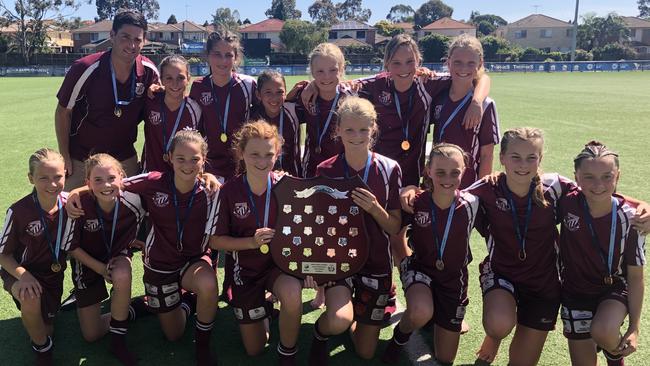 The successful Harbord Public School team with their trophy.