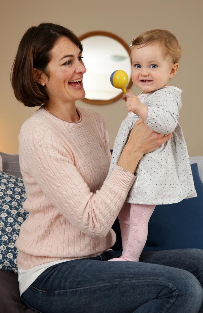 Alex Martin, 40, had her eggs frozen when she was 35 but decided she couldn't wait any longer for the right partner. She now has a one-year-old daughter, Holly. Pictured at their Bondi home. Picture: Jonathan Ng