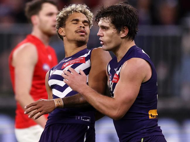 PERTH, AUSTRALIA - JUNE 24: Liam Henry of the Dockers reacts after missing a shot on goal during the 2023 AFL Round 15 match between the Fremantle Dockers and the Essendon Bombers at Optus Stadium on June 24, 2023 in Perth, Australia. (Photo by Will Russell/AFL Photos via Getty Images)