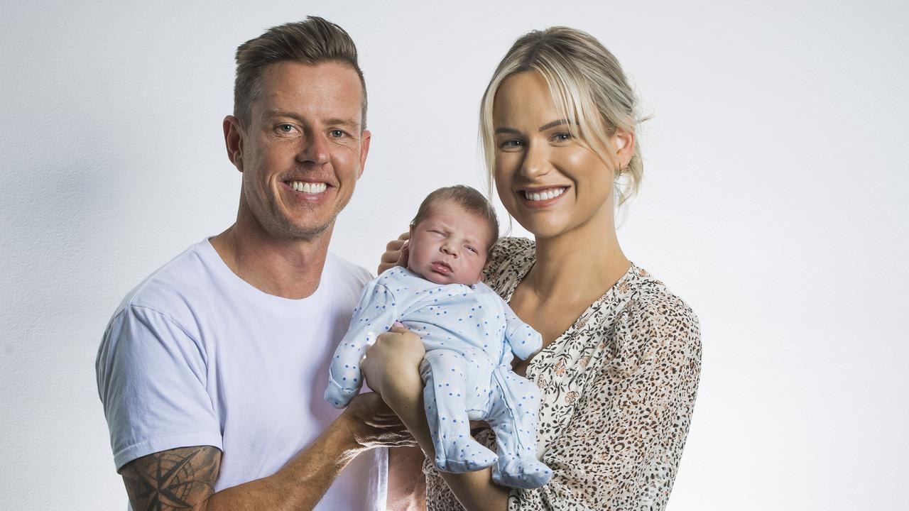 James Courtney with son Kobe and wife Tegan. Picture: Nigel Hallett