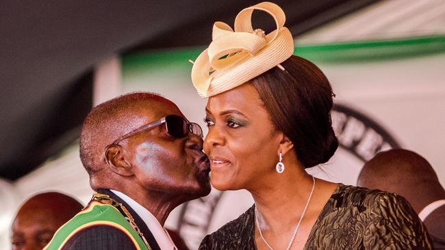 Zimbabwe President Robert Mugabe, 93, and his wife Grace, 52. Picture: AFP / Jekesai Njikizana.