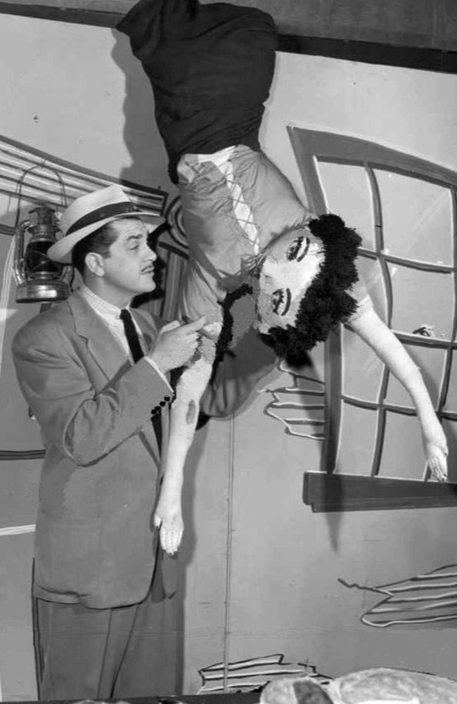 Kovacs performs a stunt on his Philadelphia early morning show Three to Get Ready in 1951. 