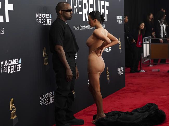 Kanye West, left, and Bianca Censori and the “invisible dress” at the Grammys. Picture: AP