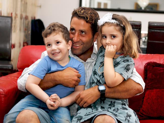 Noah and Lahela al-Amin pose for a picture with their father Ali Elamine. Picture: Supplied