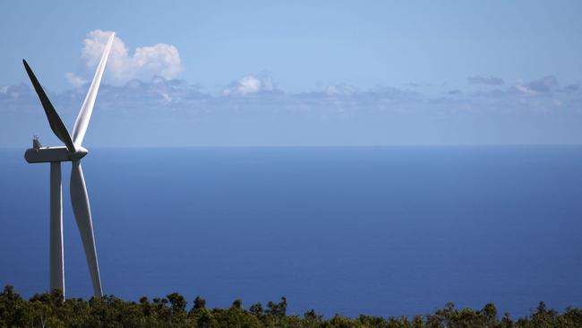 This photograph shows a TotalEnergies' wind turbine at the La Perriere wind farm in Sainte-Suzanne on the French overseas island of la Reunion, on January 22, 2025. (Photo by Richard BOUHET / AFP)