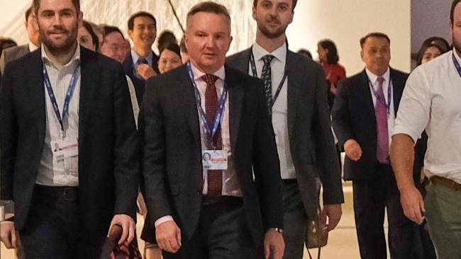 Climate Change Minister Chris Bowen leads the Australian delegation out of the Al Waha room at COP28 in Dubai. Picture: Jacquelin Magnay