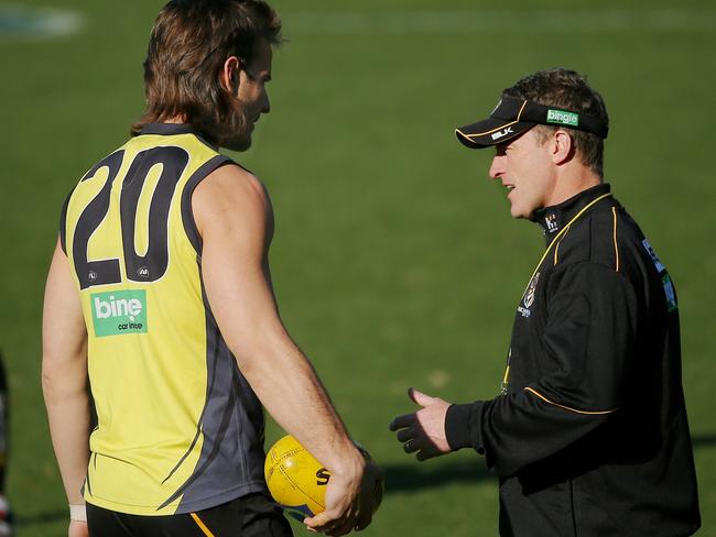 More serious business ... Damien Hardwick chats to ruckman Ivan Maric at Tigers training. Picture: Colleen Petch