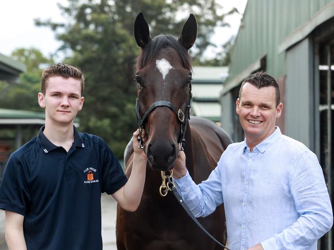 Daily Telegraph. 29, March, 2023.Trainer Joe Pride, with his son, Brave, 17, with one of his runners, Private Eye, at his Warwick Farm stables, today.Hi son Brave is always helping out around stables with the horses, and goes to the races every weekend.Picture: Justin Lloyd.